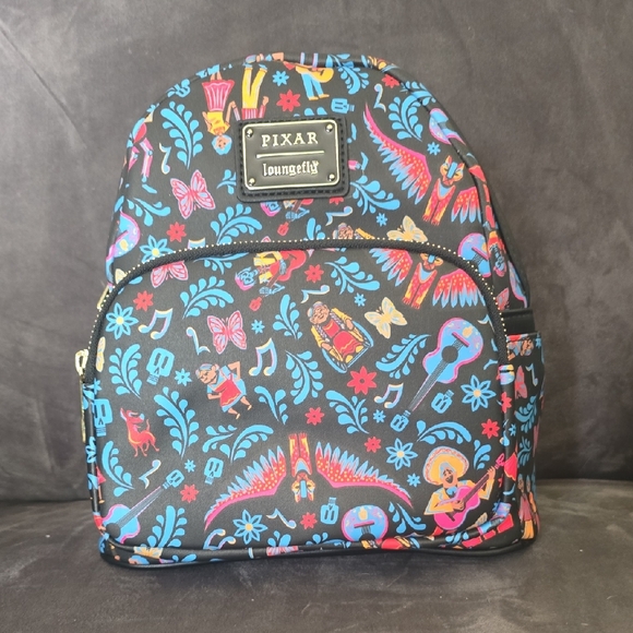 Loungefly Handbags - Loungefly Pixar CoCo Backpack